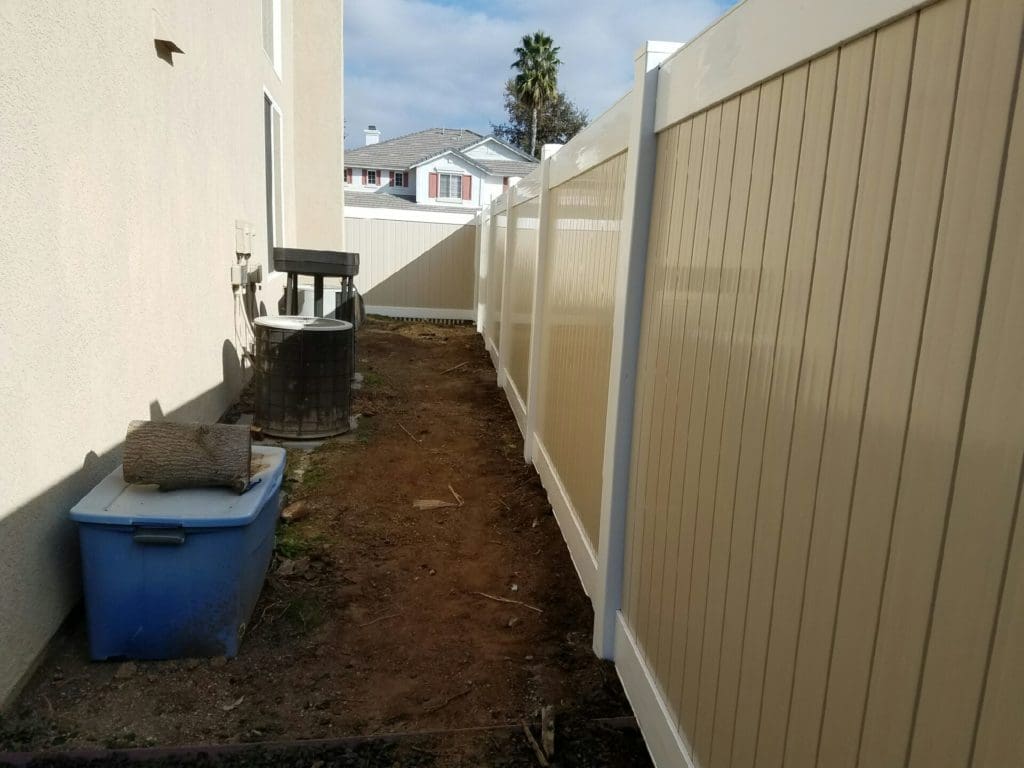 white/tan two tone vinyl fence